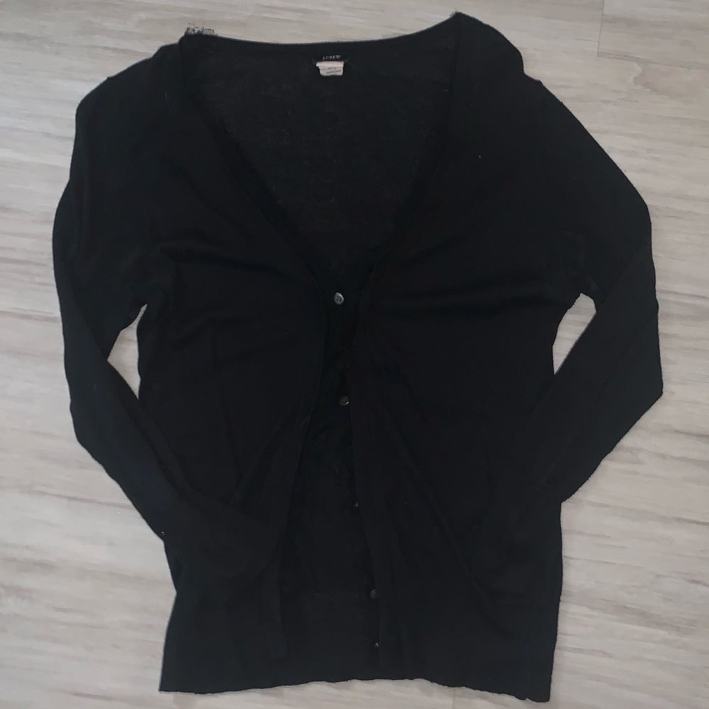 Black cardigan with ruffles